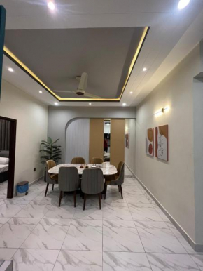 Travellers Heaven 3BR APT DHA PHASE VI Nishat Commercial
